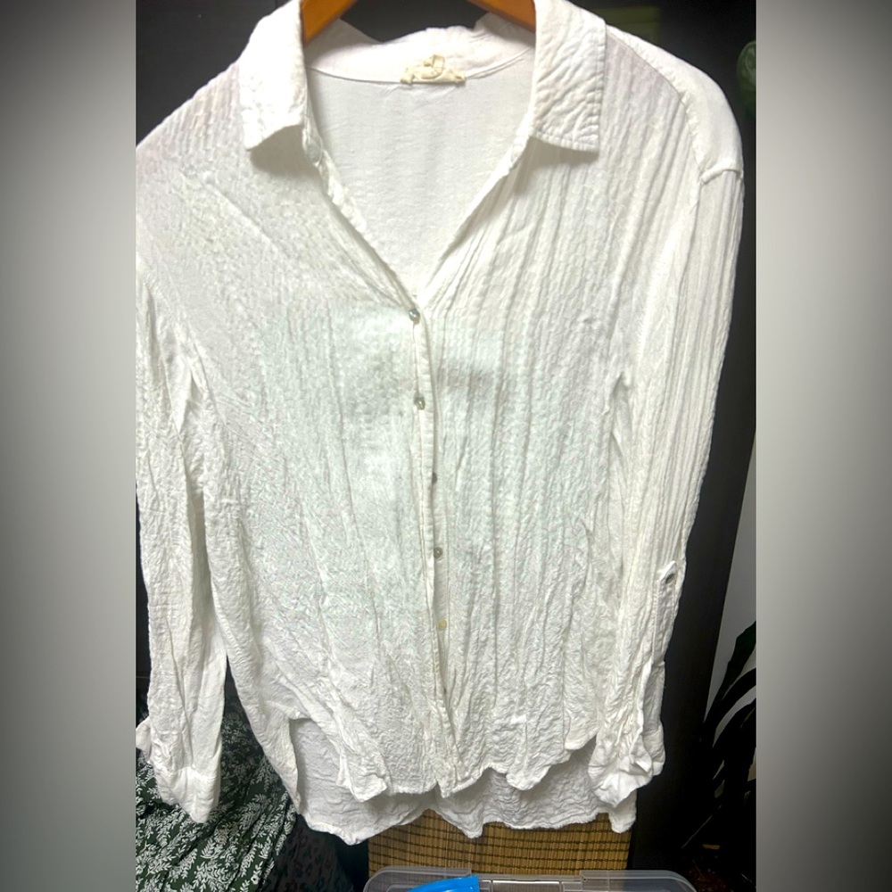 White with textured fabric. Very light and flowy